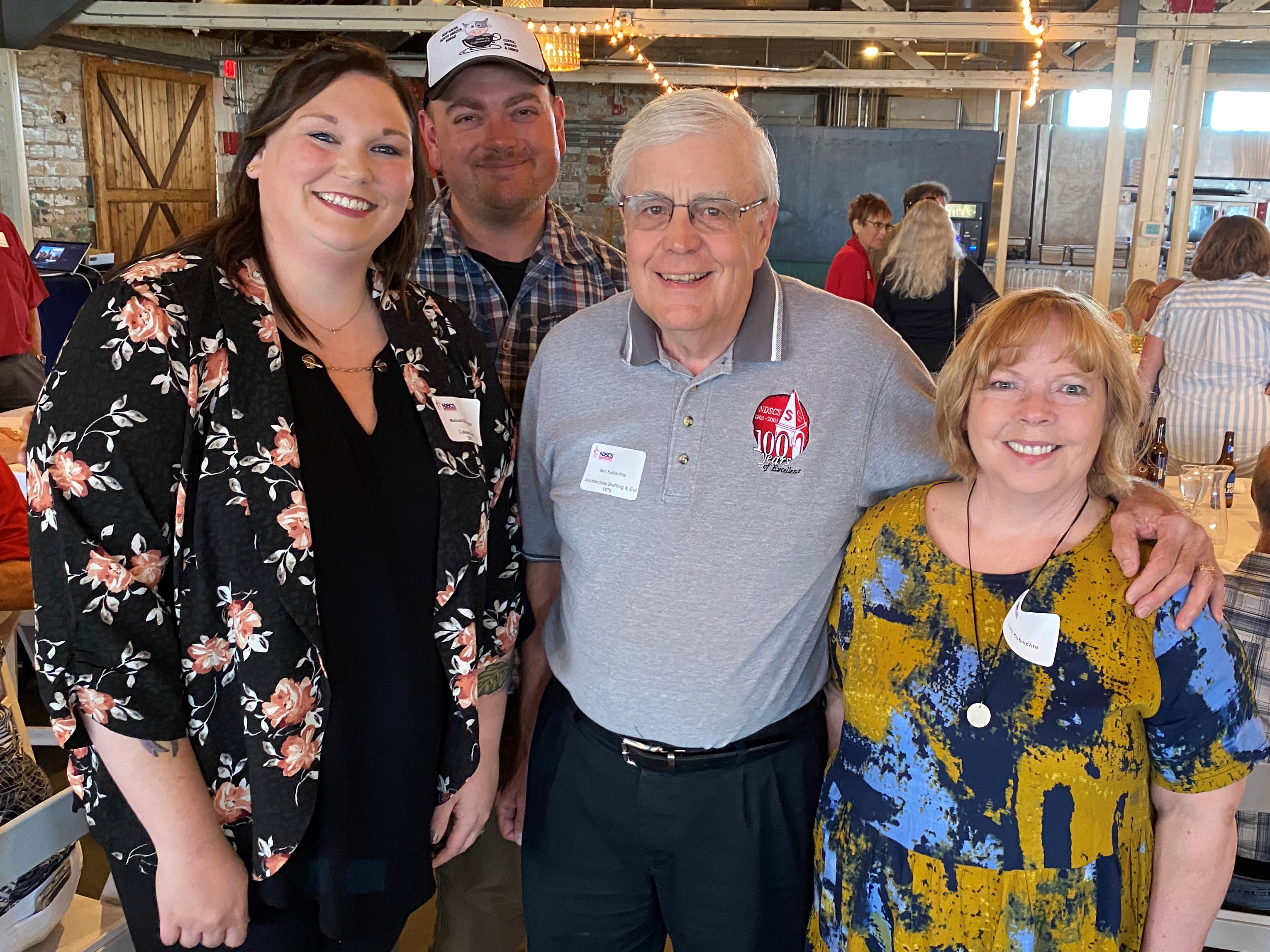 Four alumni together at meet and greet in Bismarck, ND