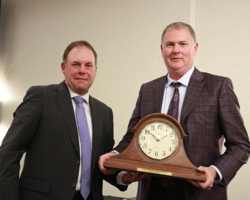          Steve Farden (right) is presented with the Agrey Award by Russ Hanson   